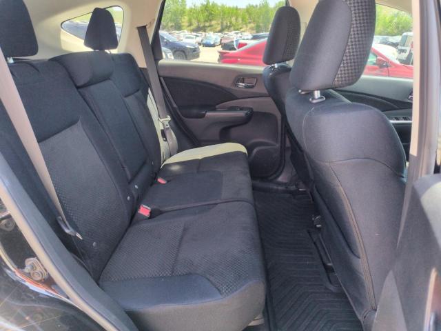 Photo 11 from auction – 2016 HONDA CR-V EX with VIN 2HKRM4H57GH680995