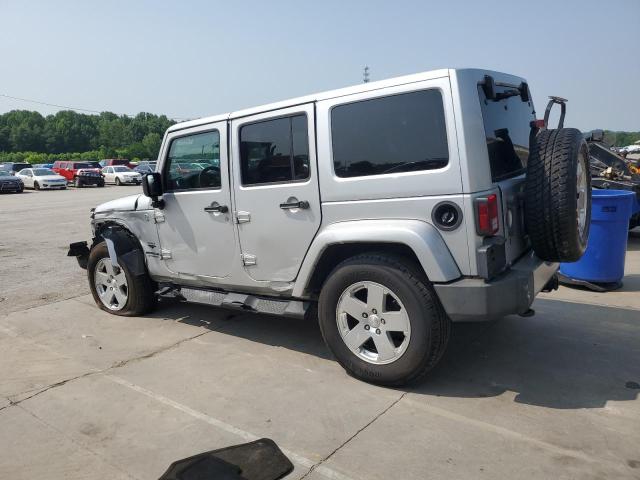 Photo 2 from auction – 2011 JEEP WRANGLER U with VIN 1J4BA5H16BL593875
