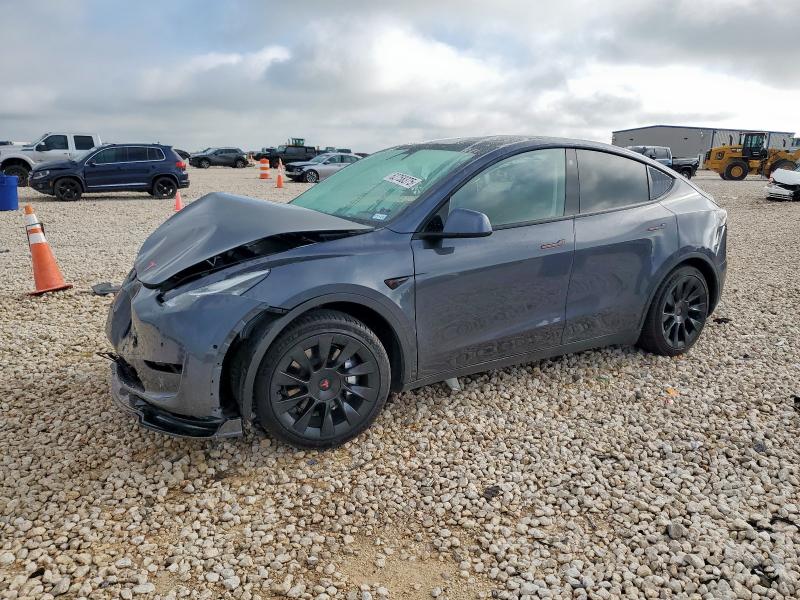 TESLA MODEL Y 2022 с VIN 7SAYGAEE0NF310489 - Фото с аукциона
