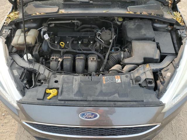 Photo 11 from auction – 2015 FORD FOCUS S with VIN 1FADP3E25FL364744
