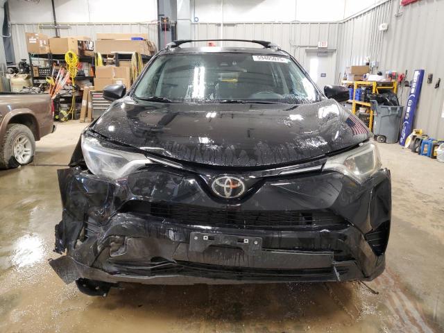Photo 5 from auction – 2018 TOYOTA RAV4 LE with VIN 2T3BFREV0JW734635