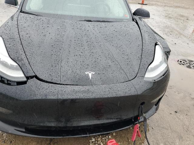 Photo 11 from auction – 2018 TESLA MODEL 3 with VIN 5YJ3E1EA9JF095215