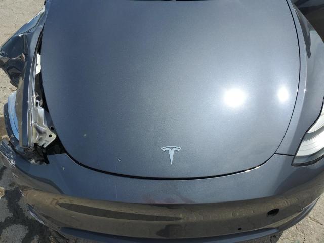 Photo 11 from auction – 2022 TESLA MODEL Y with VIN 7SAYGDEE1NA018638