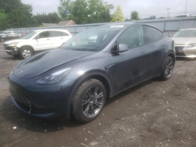 TESLA MODEL Y 2024 with VIN 7SAYGDED5RF199713 - Photo from auction