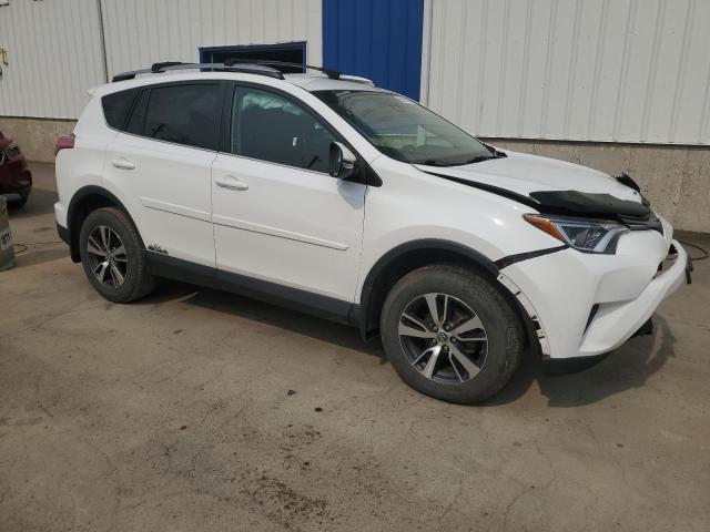Photo 4 from auction – 2018 TOYOTA RAV4 LE with VIN 2T3ZFREV7JW504122