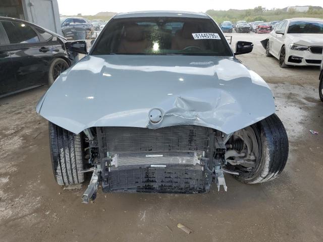 Photo 5 from auction – 2023 BMW 330XI with VIN 3MW89FF06P8D28491