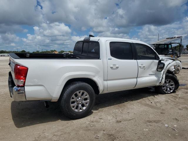 Photo 3 from auction – 2016 TOYOTA TACOMA with VIN 5TFAZ5CN5GX014802
