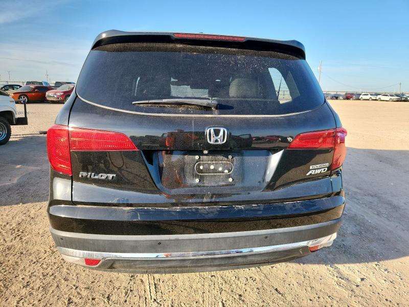 Photo 6 from auction – 2016 HONDA PILOT TOUR with VIN 5FNYF6H98GB123290