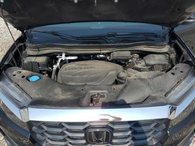Photo 12 from auction – 2023 HONDA PASSPORT E with VIN 5FNYF8H52PB008094