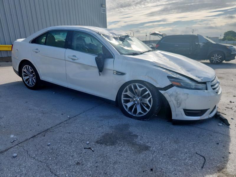 Photo 4 from auction – 2014 FORD TAURUS LIM with VIN 1FAHP2F85EG112126