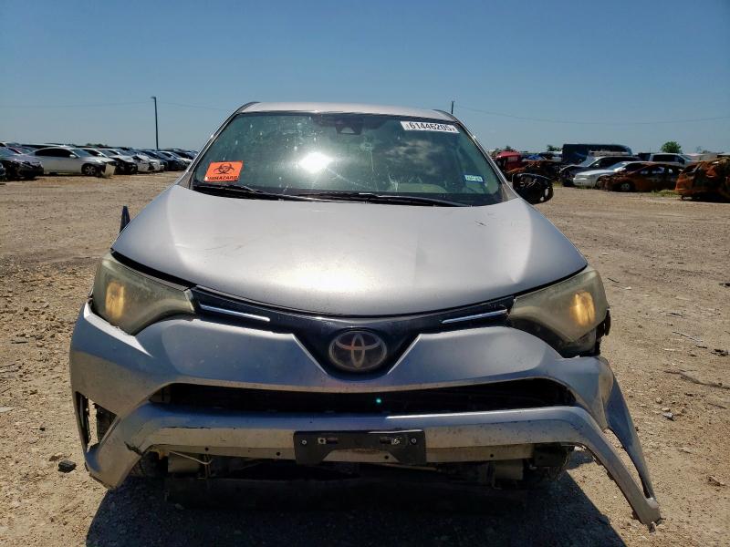 Photo 5 from auction – 2018 TOYOTA RAV4 LE with VIN 2T3ZFREV6JW410216
