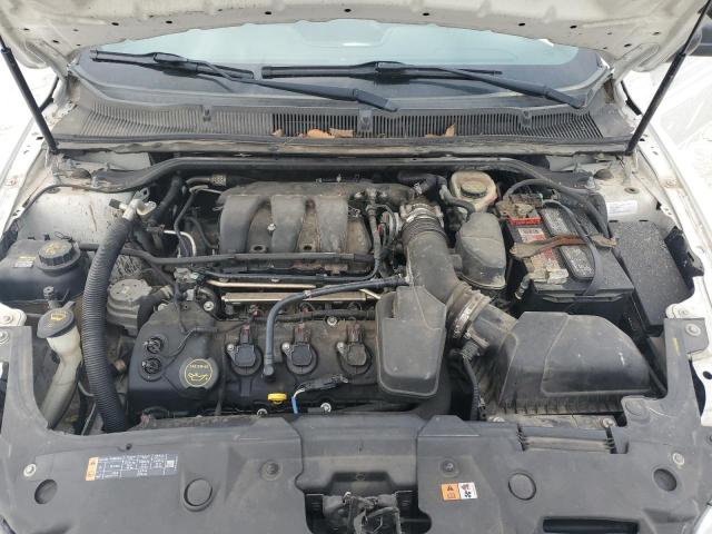 Photo 11 from auction – 2015 FORD TAURUS POL with VIN 1FAHP2MKXFG192359