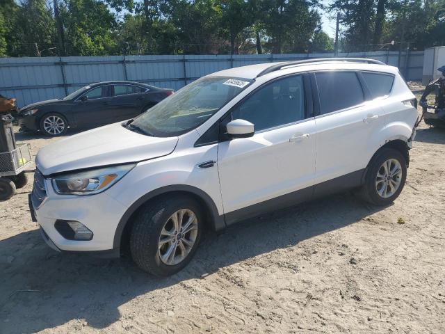 FORD ESCAPE SE 2018 with VIN 1FMCU0GD9JUB21089 - Photo from auction