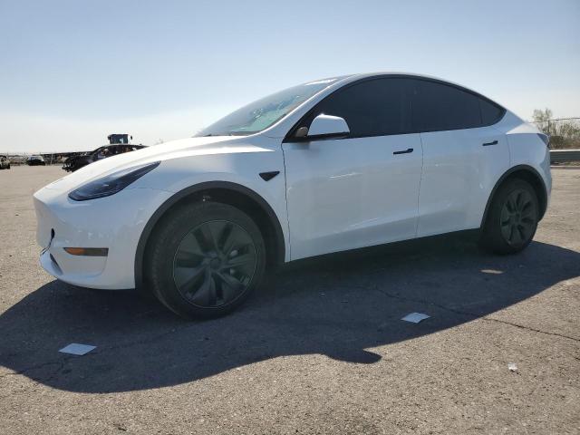 TESLA MODEL Y 2025 with VIN 7SAYGDED0SF240884 - Photo from auction