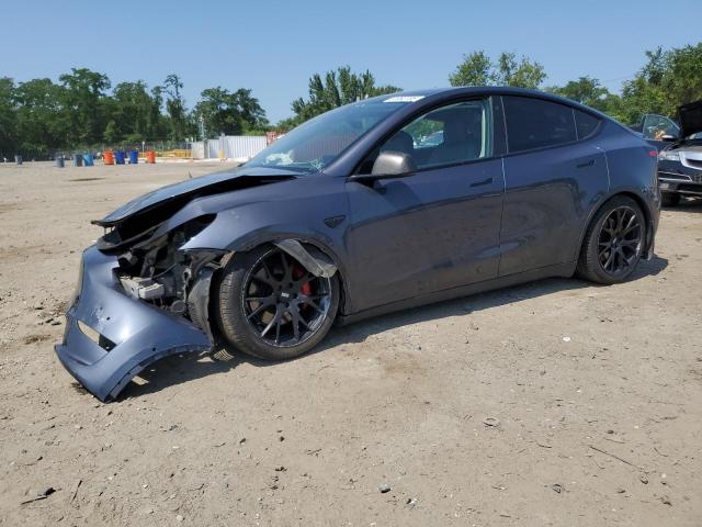 TESLA MODEL Y 2022 with VIN 7SAYGDEF9NF387727 - Photo from auction