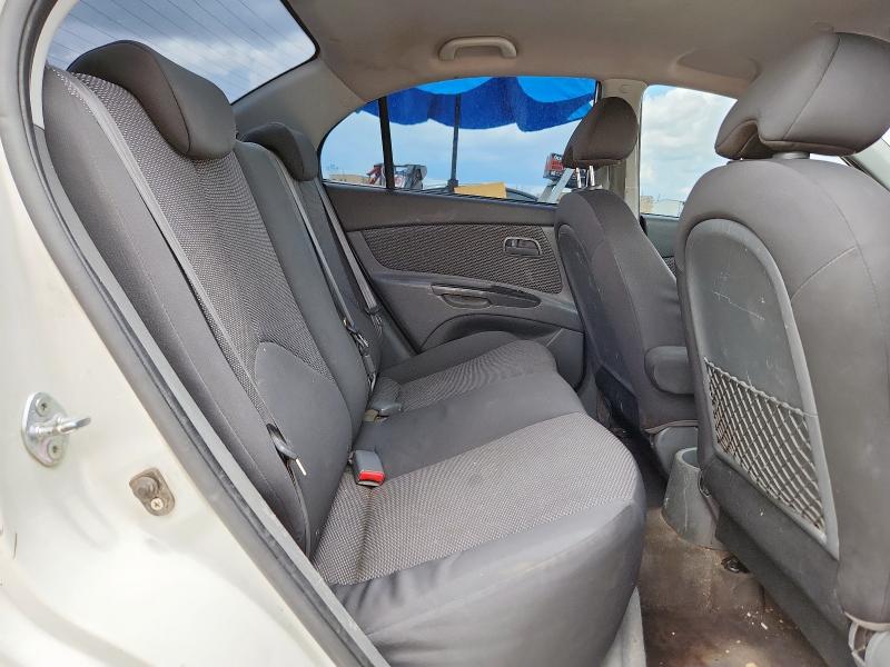 Photo 10 from auction – 2011 KIA RIO BASE with VIN KNADH4A39B6960814