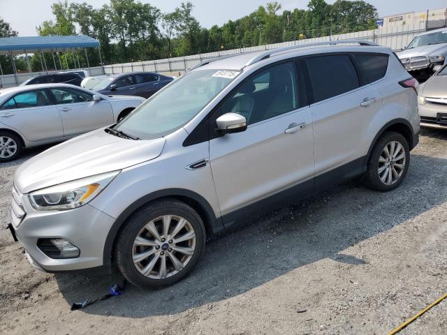 FORD ESCAPE TIT 2017 with VIN 1FMCU0JD8HUD64122 - Photo from auction