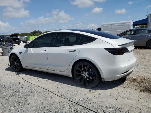 Photo 2 from auction – 2021 TESLA MODEL 3 with VIN 5YJ3E1EA6MF020847