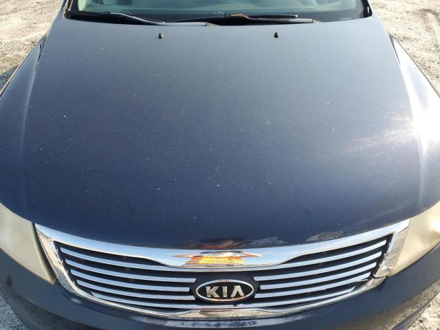 Photo 11 from auction – 2009 KIA OPTIMA LX with VIN KNAGE228895349418
