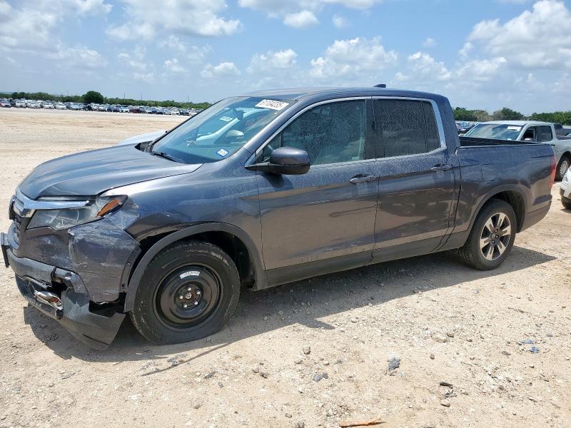 HONDA RIDGELINE 2018 with VIN 5FPYK2F66JB002057 - Photo from auction