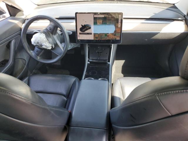 Photo 8 from auction – 2018 TESLA MODEL 3 with VIN 5YJ3E1EB8JF084716