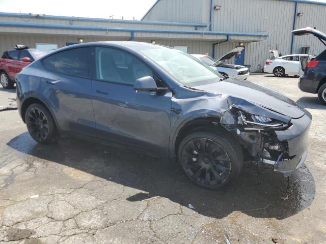 Foto 4 de la subasta – 2022 TESLA MODEL Y con VIN 7SAYGDEE1NA018638