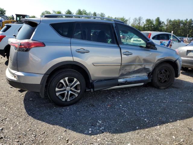 Photo 3 from auction – 2018 TOYOTA RAV4 LE with VIN 2T3BFREV7JW723969