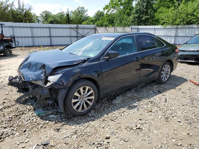 TOYOTA CAMRY LE 2017 with VIN 4T1BF1FK0HU395724 - Photo from auction