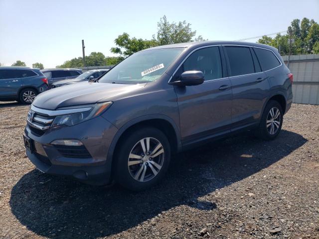 HONDA PILOT EXL 2017 with VIN 5FNYF6H84HB104180 - Photo from auction