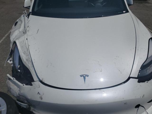 Photo 11 from auction – 2022 TESLA MODEL 3 with VIN 5YJ3E1EB6NF127326