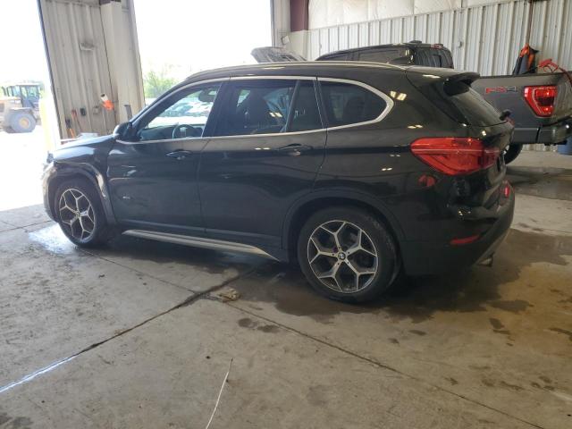 Photo 2 from auction – 2016 BMW X1 XDRIVE2 with VIN WBXHT3C35G5F64358