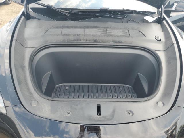 Photo 11 from auction – 2023 TESLA MODEL Y with VIN 7SAYGDEE9PF830985
