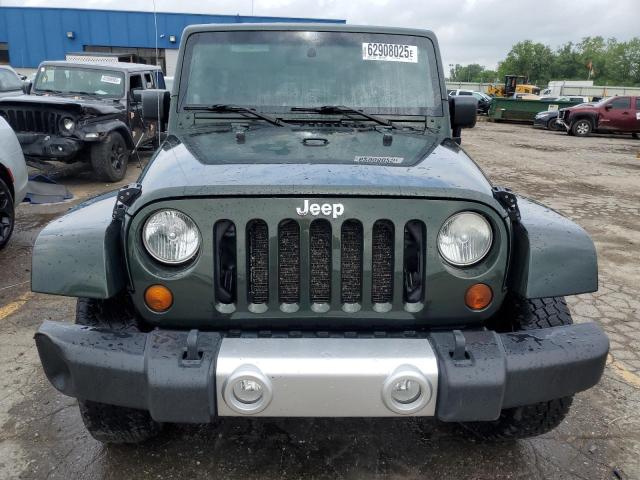 Photo 5 from auction – 2010 JEEP WRANGLER U with VIN 1J4BA5H19AL125699