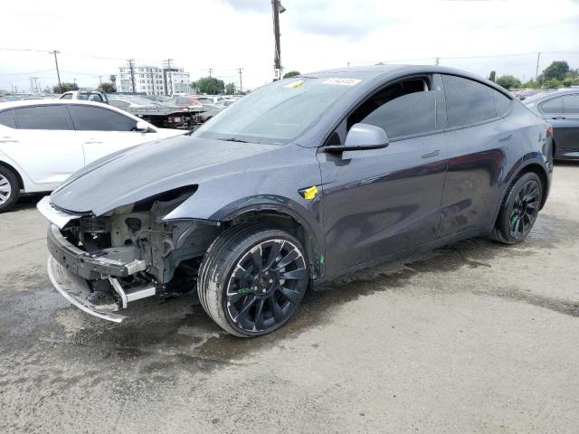 TESLA MODEL Y 2024 with VIN 7SAYGDEE7RA267757 - Photo from auction