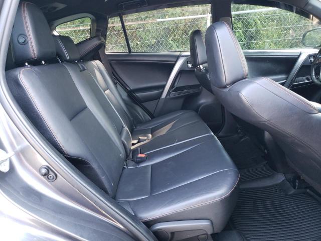 Photo 11 from auction – 2018 TOYOTA RAV4 SE with VIN JTMJFREV3JJ201592