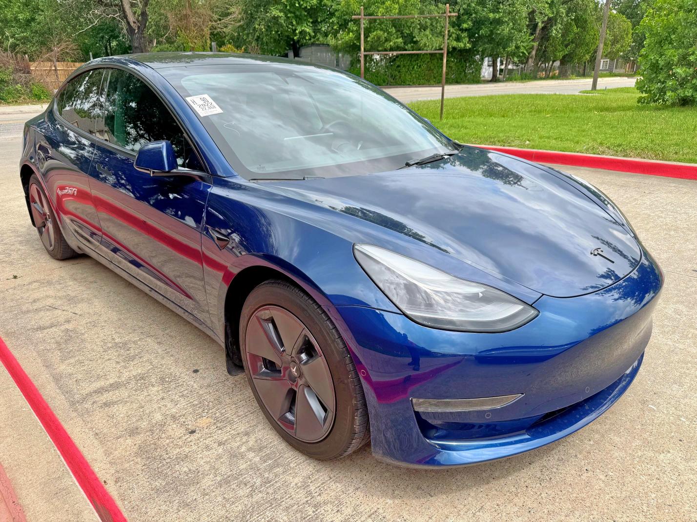TESLA MODEL 3 2022 with VIN 5YJ3E1EA8NF322335 - Photo from auction