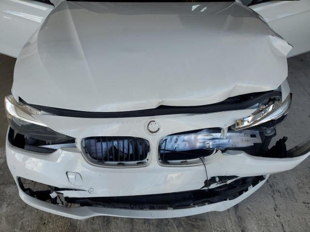 Photo 11 from auction – 2017 BMW 320 I with VIN WBA8A9C34HK864184