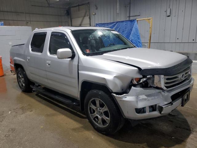 Photo 4 from auction – 2014 HONDA RIDGELINE with VIN 5FPYK1F56EB001577