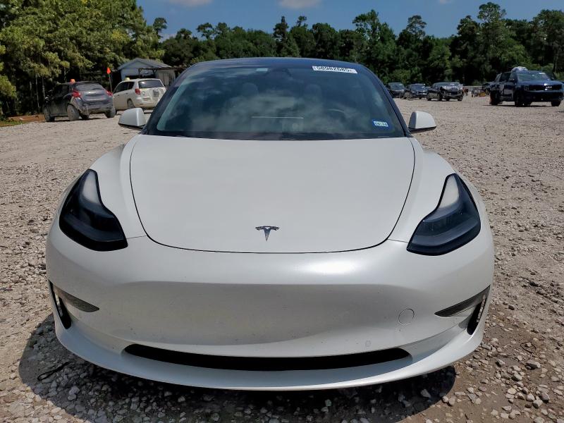 Photo 5 from auction – 2021 TESLA MODEL 3 with VIN 5YJ3E1EA9MF989879