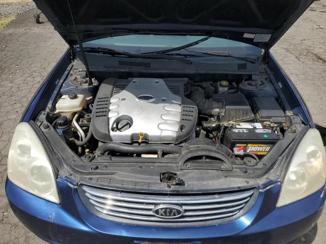 Photo 11 from auction – 2006 KIA OPTIMA LX with VIN KNAGE124165030252