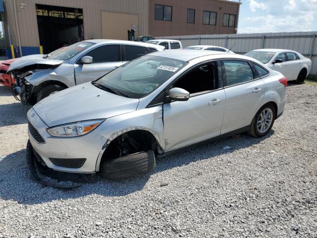 FORD FOCUS SE 2017 with VIN 1FADP3F29HL323387 - Photo from auction