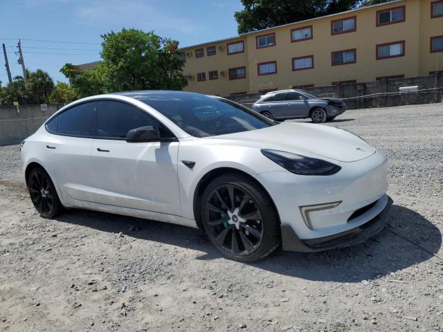Photo 4 from auction – 2021 TESLA MODEL 3 with VIN 5YJ3E1EA6MF020847