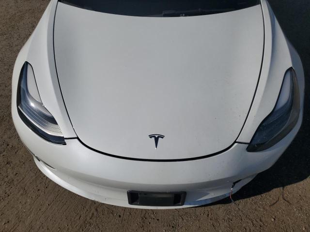 Photo 11 from auction – 2022 TESLA MODEL 3 with VIN 5YJ3E1EB4NF170837