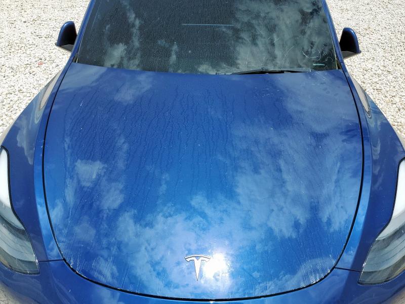 Photo 11 from auction – 2021 TESLA MODEL Y with VIN 5YJYGDEF9MF151400