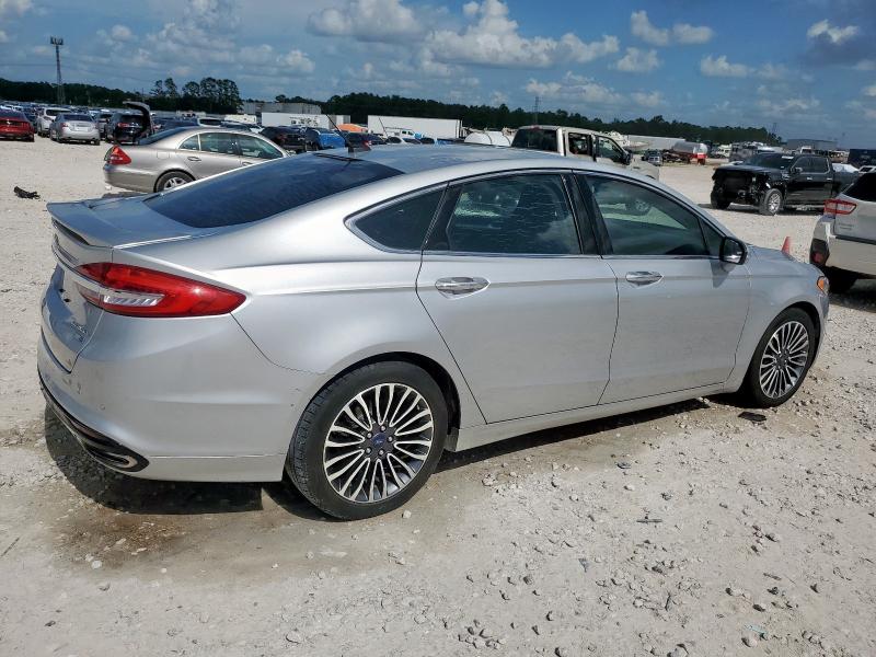 Photo 3 from auction – 2018 FORD FUSION TIT with VIN 3FA6P0D91JR188632