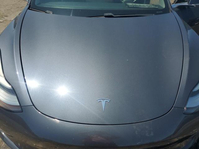 Photo 11 from auction – 2019 TESLA MODEL 3 with VIN 5YJ3E1EA7KF298654