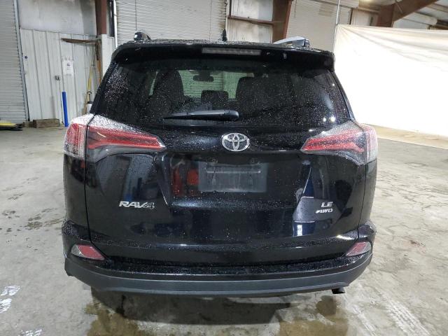 Photo 6 from auction – 2018 TOYOTA RAV4 LE with VIN 2T3BFREV0JW731394