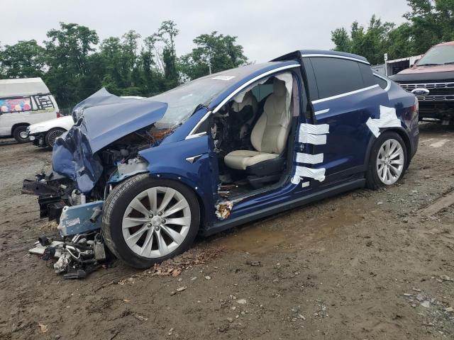 TESLA MODEL X 2020 with VIN 5YJXCDE22LF261644 - Photo from auction