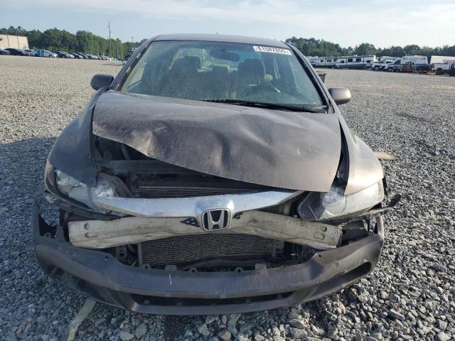 Photo 5 from auction – 2011 HONDA CIVIC LX with VIN 19XFA1F59BE012979