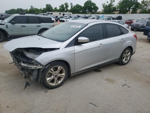 FORD FOCUS SE 2014 with VIN 1FADP3F24EL349875 - Photo from auction